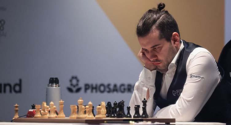 Российские букмекеры не верят, что Непомнящий отберет шахматную корону у Карлсена